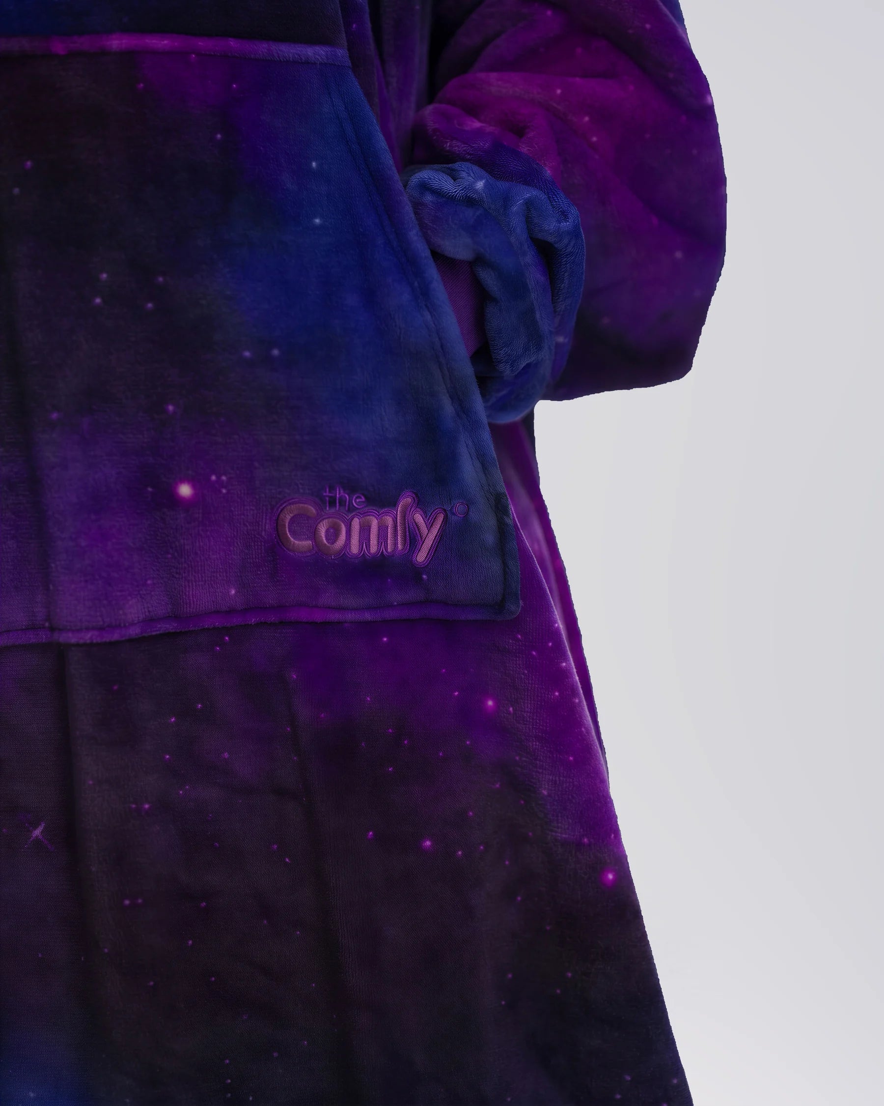 Close-up of The Dream Long in Galaxy showing DreamHaven™ fabric, the front pocket, and tonal Comfy embroidery.