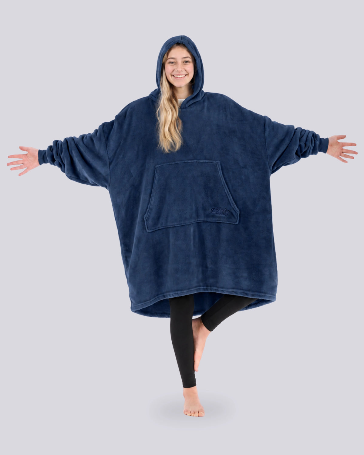Model wearing The Dream in Blue, full-length hero view. Arms are stretch out.