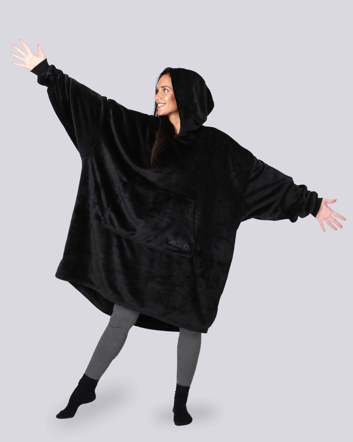 Model wearing The Dream in Black, showing its oversized silhouette, hood, and DreamHaven™ single-layer softness.