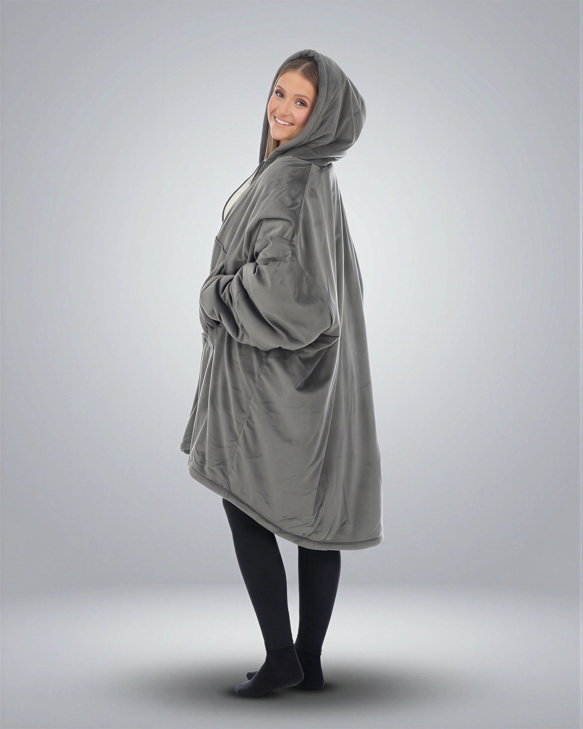 Side view of The Original Full-Zip wearable blanket in charcoal highlighting relaxed silhouette and full-length zipper design