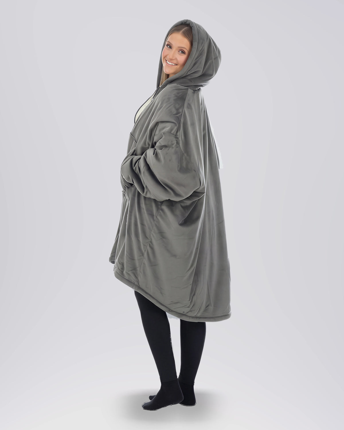 Side view of The Original Full-Zip wearable blanket in charcoal highlighting relaxed silhouette and full-length zipper design