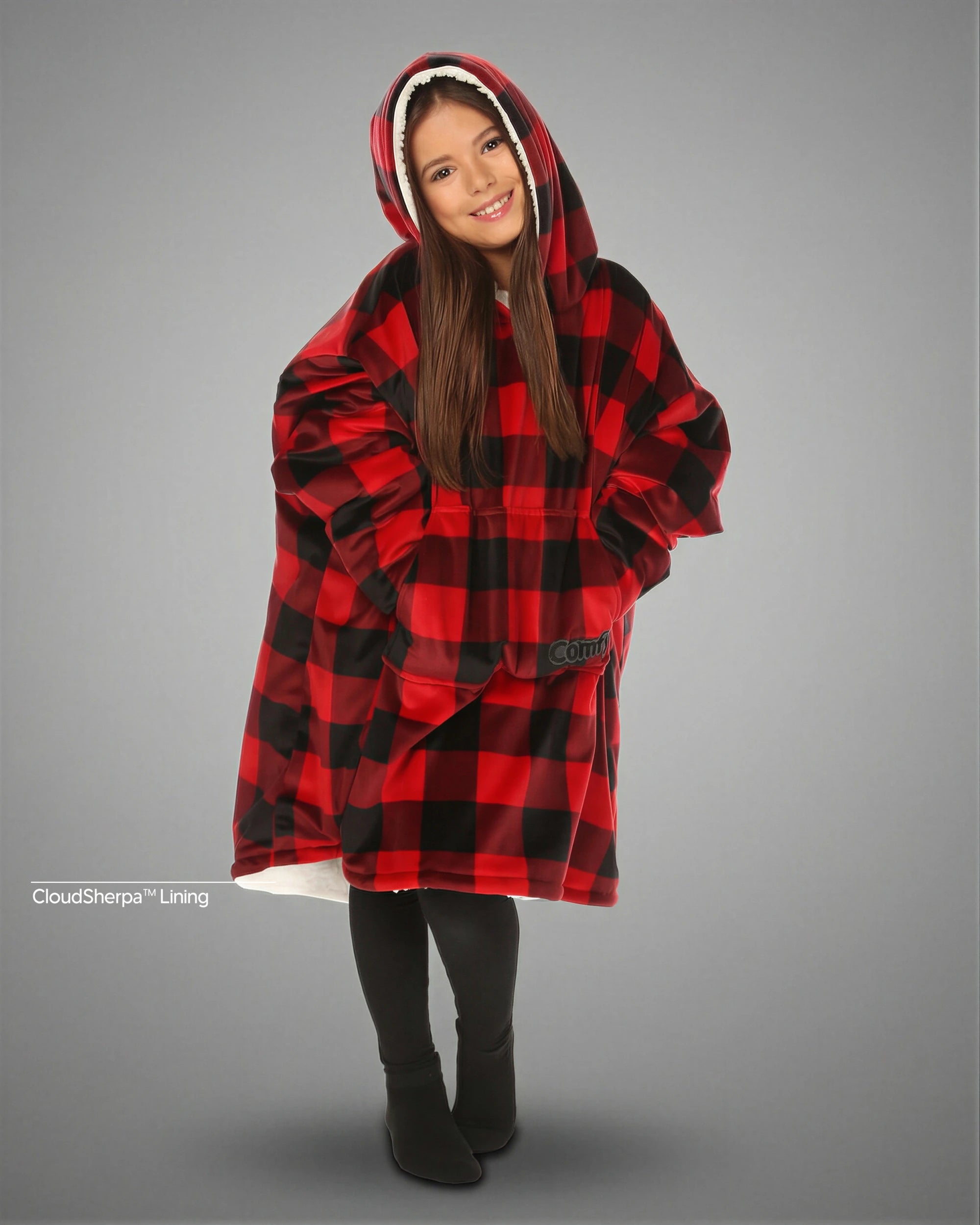 Child wearing The Original Jr. Red Plaid wearable blanket with CloudSherpa™ lining, featuring the classic buffalo plaid pattern, oversized hood, and cozy all-day comfort.