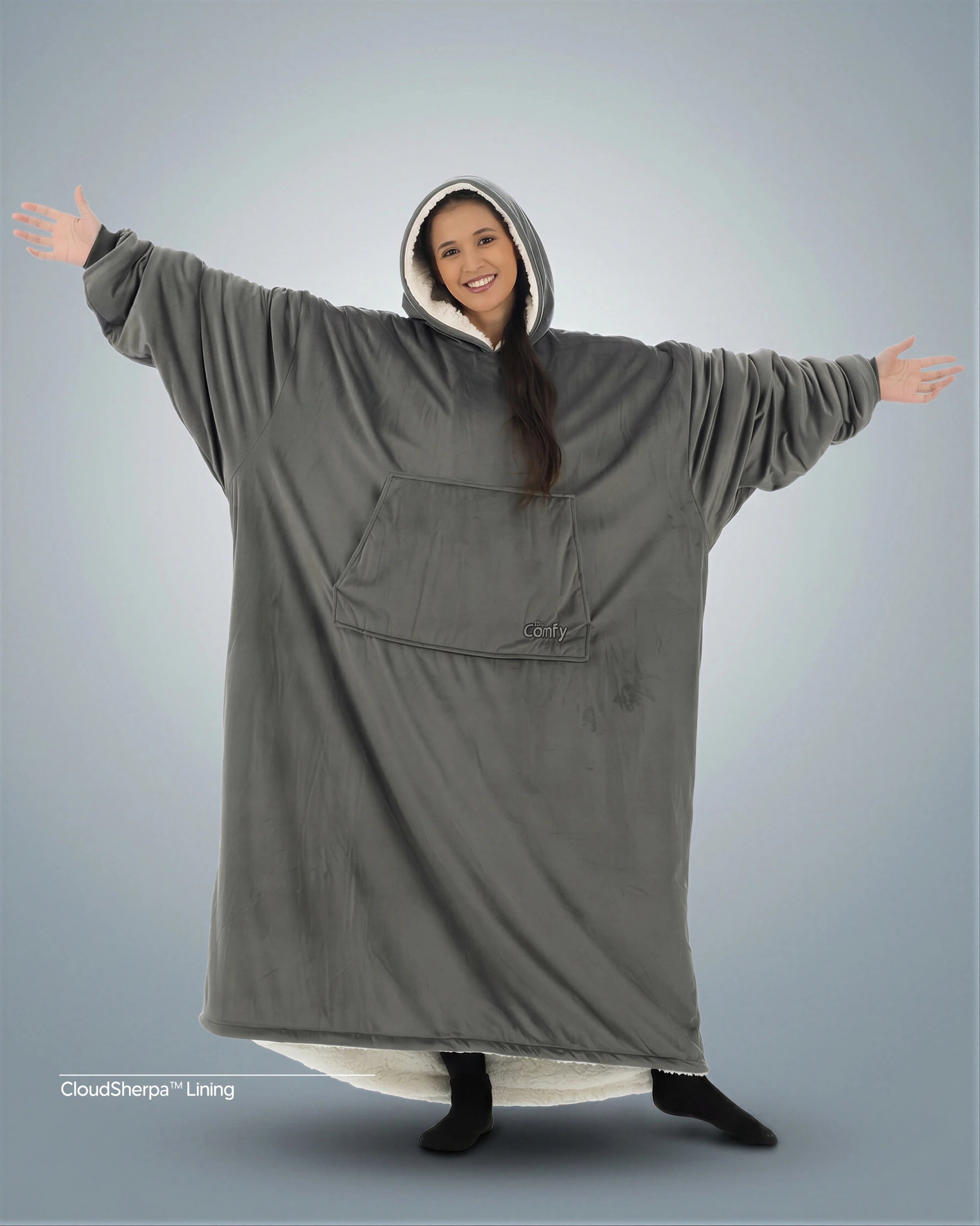 Woman wearing The Comfy Original Long in charcoal with CloudSherpa™ lining, front view showing oversized silhouette.