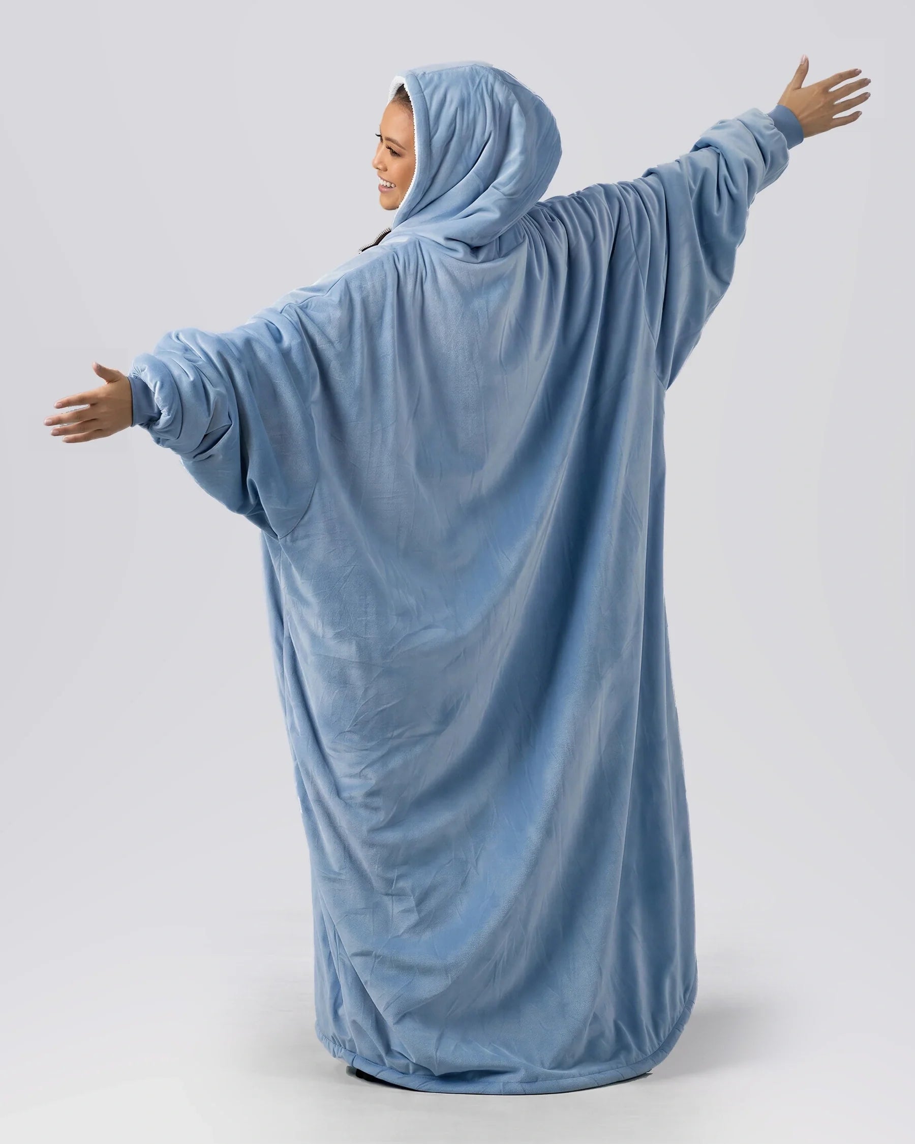 Back view of The Original Long in Serenity Blue, showcasing the extended length, oversized design, and full-coverage comfort from head to toe.