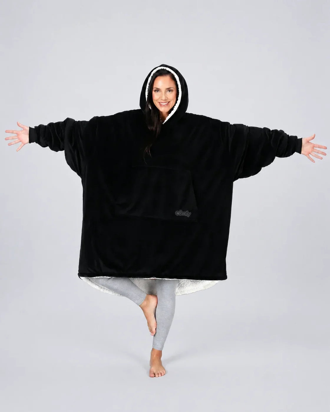 The Original wearable blanket in Black, shown full length with its oversized fit and plush CloudSherpa™ lining.