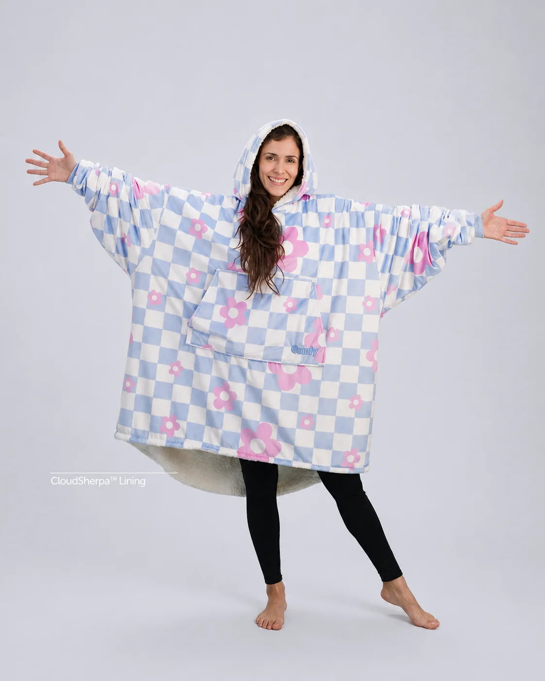 Front-facing hero image of The Original in Flower Checkered, featuring a playful blue-and-white checker pattern with pink floral accents, oversized silhouette, kangaroo pocket, and cozy CloudSherpa™ lining.