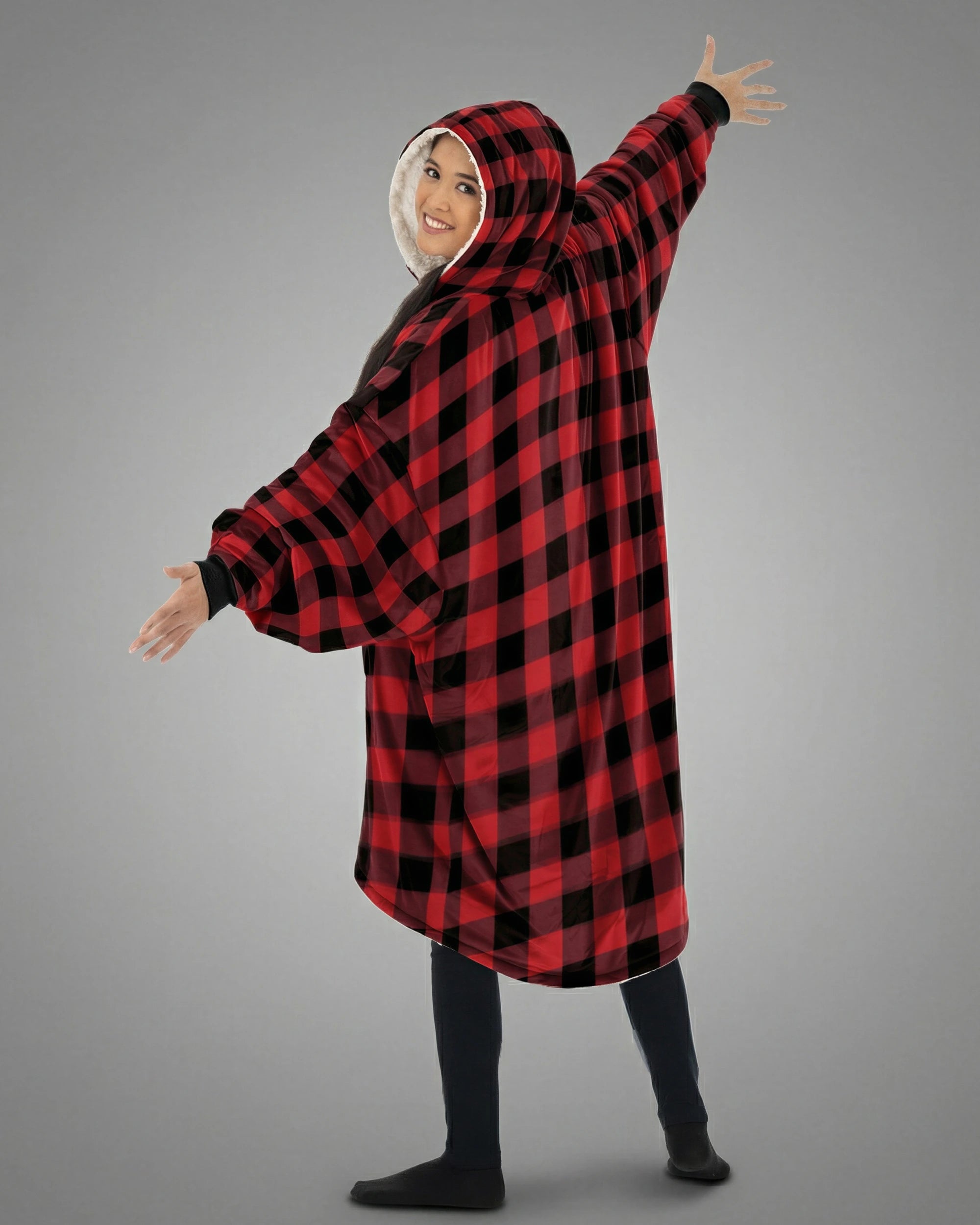 Back view of The Original wearable blanket in red plaid showing oversized fit and hood design
