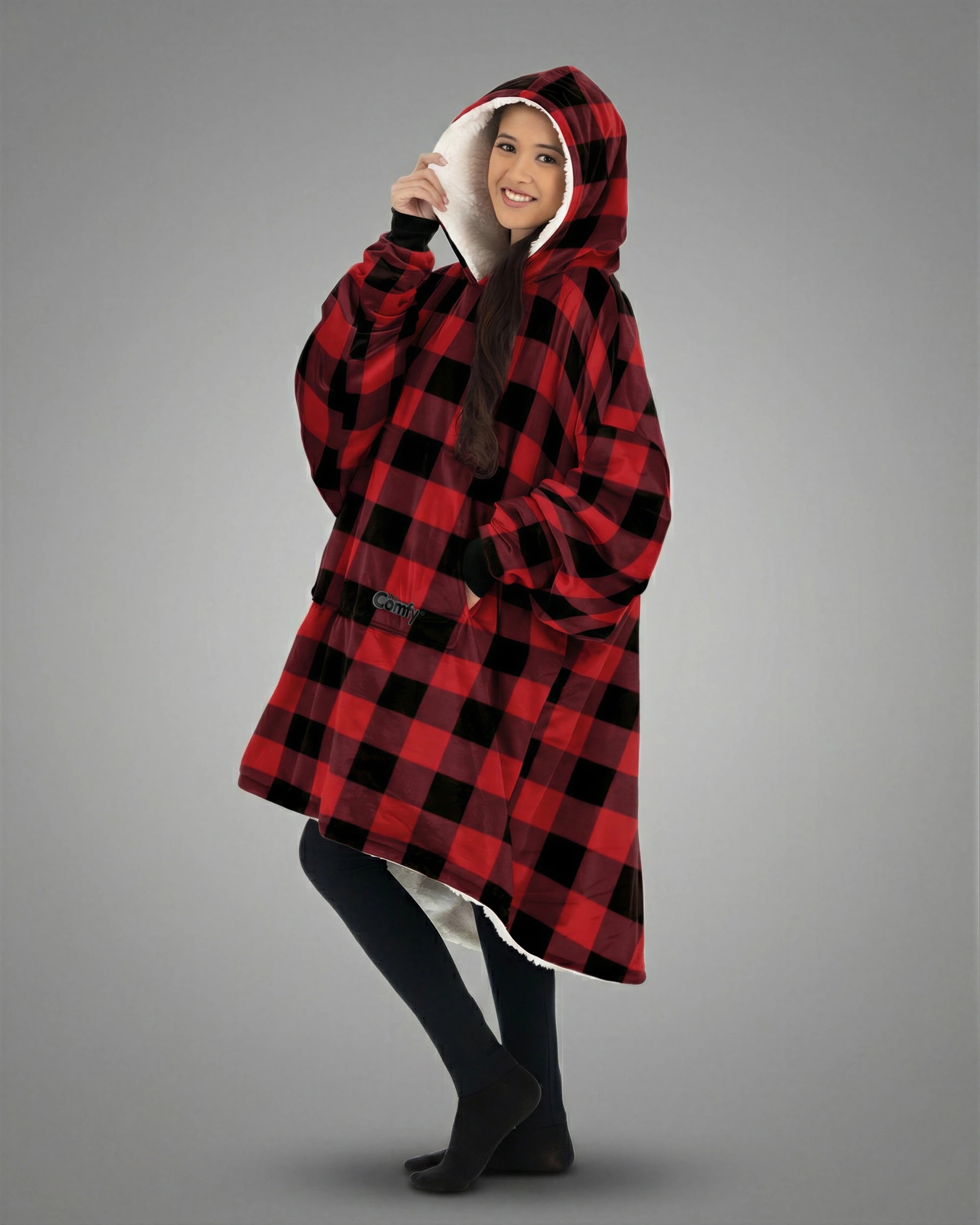 Front /side view of The Original wearable blanket in red plaid showing relaxed oversized comfort and coverage
