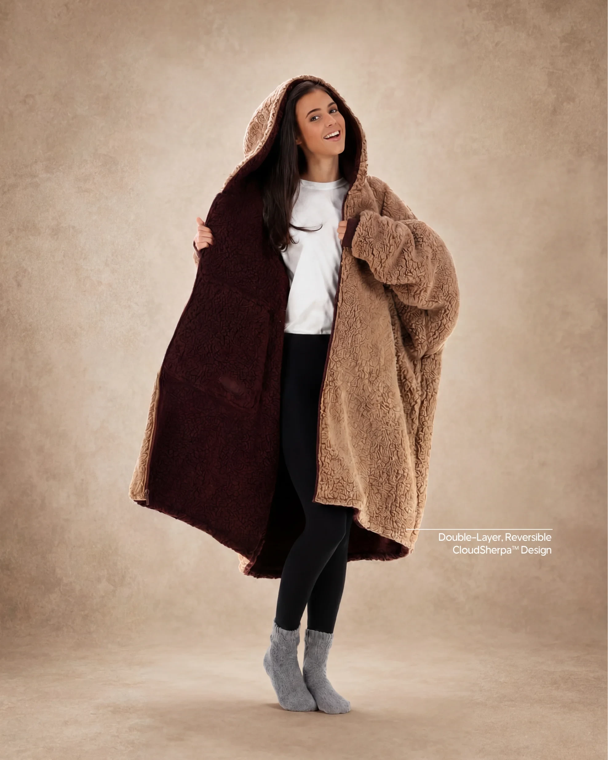Woman modeling the Teddy Bear Full-Zip in Chocolate/Camel, showcasing the reversible double-layer CloudSherpa™ design and oversized comfort.