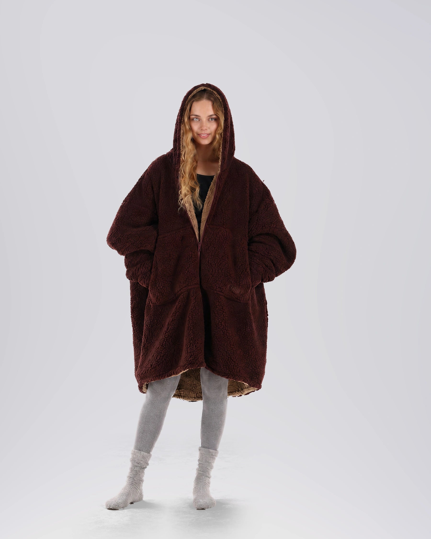 Front view of the Teddy Bear Full-Zip worn on the Chocolate side, featuring the oversized silhouette, hood, and cozy all-over CloudSherpa™ comfort.