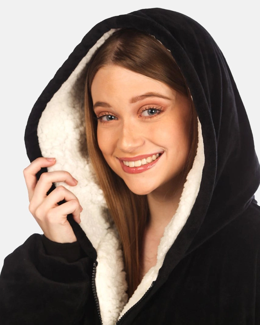 The Original Quarter-Zip wearable blanket in Black, close-up of the hood and CloudSherpa™ lining.