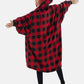 Woman showing the back of The Comfy Original Full Zip