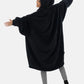 Woman showing the back of The Comfy Original Full Zip