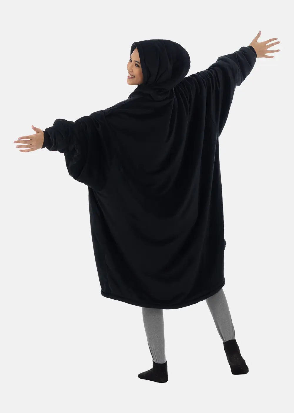 Woman showing the back of The Comfy Original Full Zip