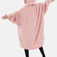 Woman showing the back of The Comfy Original Full Zip