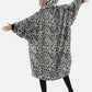 Woman showing the back of The Comfy Original Full Zip