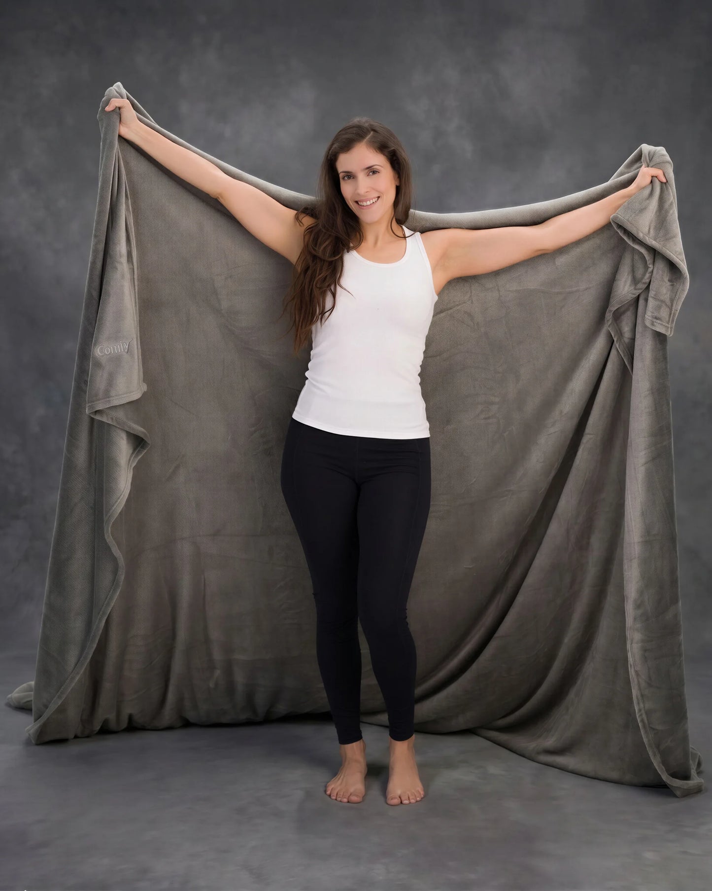 When one blanket can cover this much comfort, there’s no need to fight for the corner. The Big Blanket in Gray features an oversized 8' x 8' design with room to stretch out, share, and fully settle in.