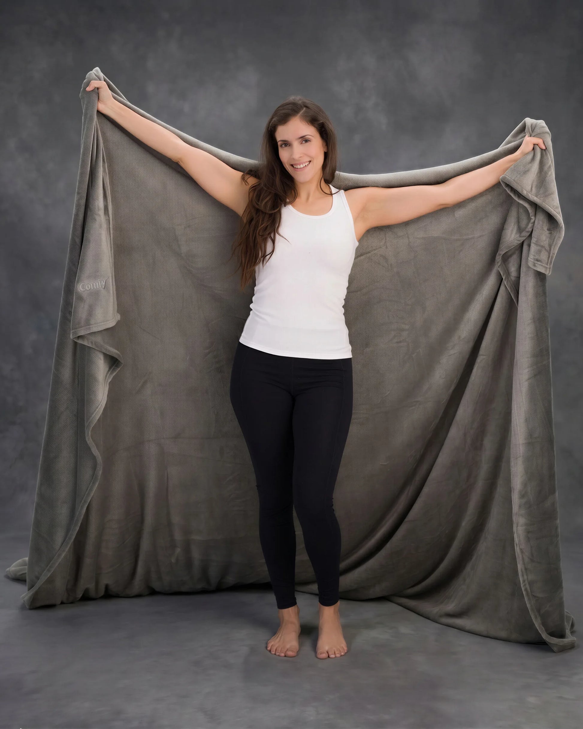 When one blanket can cover this much comfort, there’s no need to fight for the corner. The Big Blanket in Gray features an oversized 8' x 8' design with room to stretch out, share, and fully settle in.