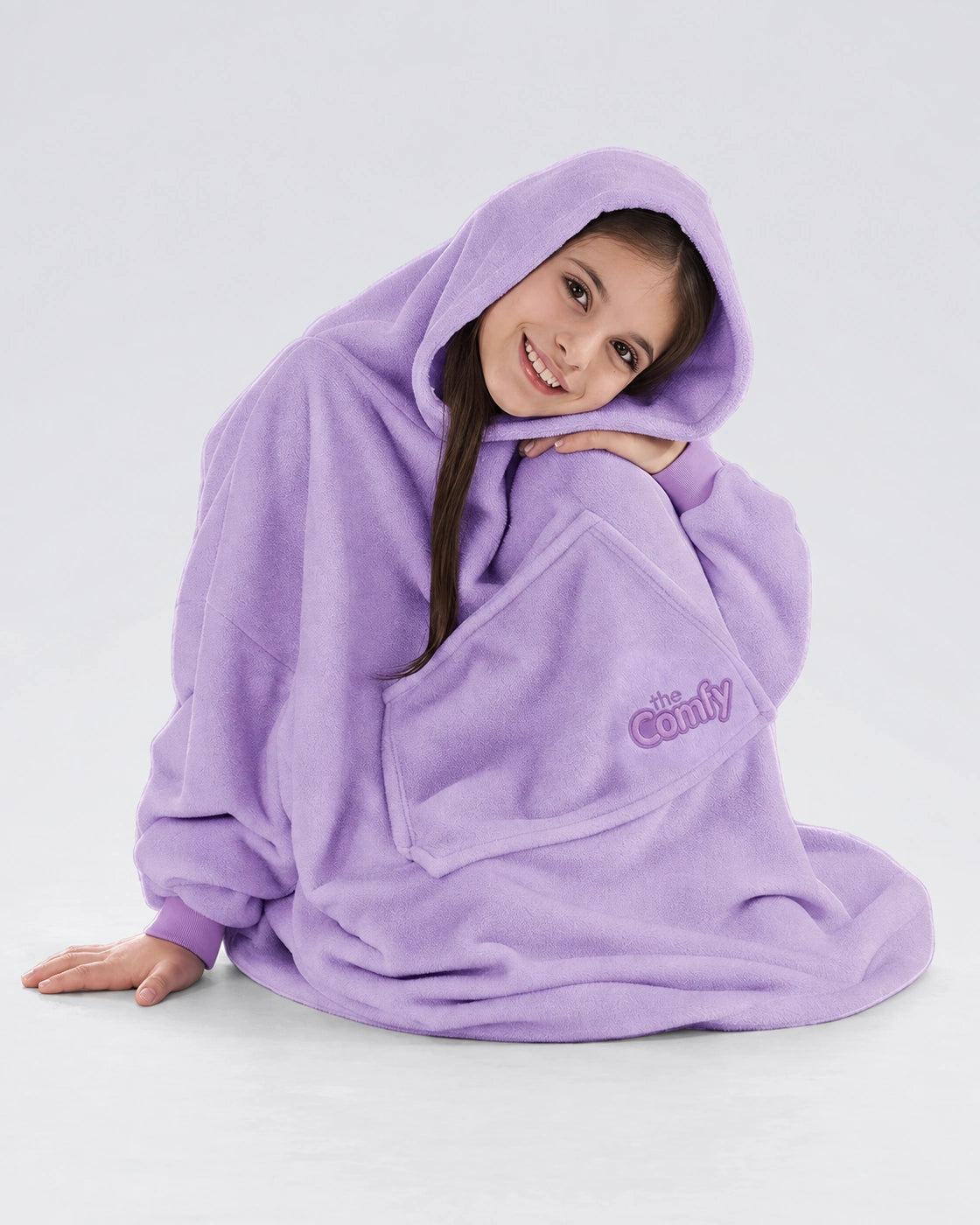 Model seated while wearing The Dream Jr. in Purple.