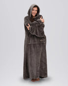 Front view of The Dream Long in Dark Gray showing its floor-length coverage, oversized sleeves, and kangaroo pocket.