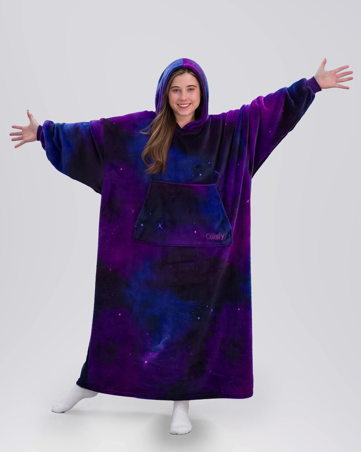Woman modeling The Dream Long in Galaxy, showing the full-length silhouette and star-filled print.