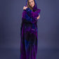 Woman wrapped in The Dream Long in Galaxy, showcasing the floor-length coverage and vibrant galaxy-inspired pattern.