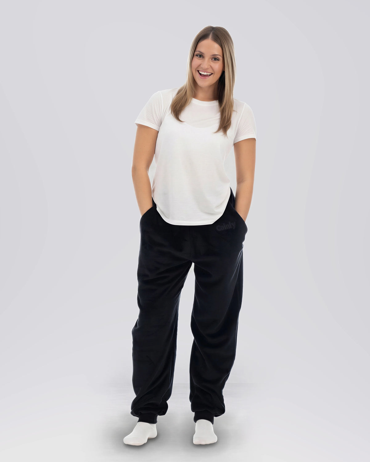 Model wearing The Dream Pants in Black, front view.