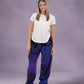Woman wearing Dream Pants in Galaxy, showcasing the relaxed fit, soft Dream fabric, and all-over cosmic print.