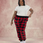Woman wearing Dream Pants in Red Plaid, showcasing the relaxed fit, soft Dream fabric, and classic buffalo check pattern.