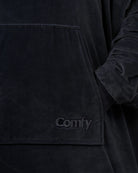 Close-up of The Dream in Black showing DreamHaven™ fabric, the kangaroo pocket, and tonal Comfy embroidery.