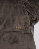 Close-up of The Dream in Dark Gray showing its fabric and embroidered logo.
