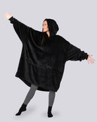 Model wearing The Dream in Black, showing its oversized silhouette, hood, and DreamHaven™ single-layer softness.