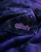 Close-up of The Dream in Galaxy showing DreamHaven™ fabric, the kangaroo pocket, and Comfy embroidery.