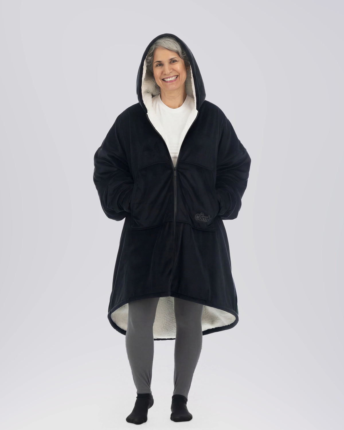 Model wearing The Original Full-Zip in Black, full-length hero view.