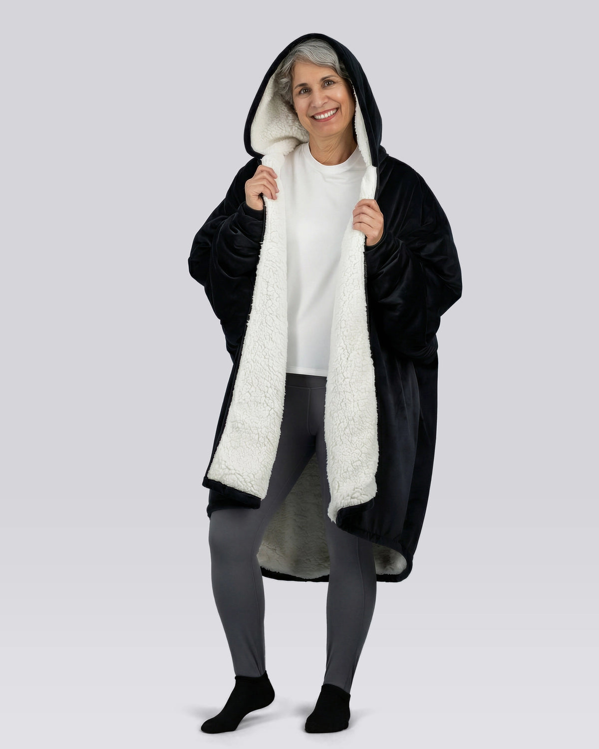 Model wearing The Original Full-Zip in Black, front view.