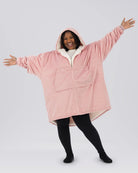 Model wearing The Original Full-Zip in Blush with arms extended to show the oversized fit.