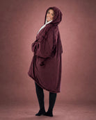Side view of The Original Full-Zip wearable blanket in Burgundy highlighting hood, longer coverage, and relaxed silhouette.