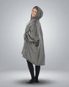 Side view of The Original Full-Zip wearable blanket in charcoal highlighting relaxed silhouette and full-length zipper design