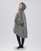 Side view of The Original Full-Zip wearable blanket in charcoal highlighting relaxed silhouette and full-length zipper design