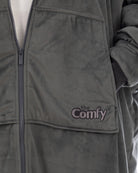 Close-up of The Original Full-Zip wearable blanket in charcoal showing zipper detail, Velveluxe™ exterior, and embroidered logo
