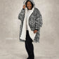 Model wearing The Original Full-Zip in Snow Leopard, showcasing the bold animal-inspired print, full-length zipper, and signature CloudSherpa™ lining for head-to-toe comfort.