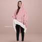 Child wearing The Original Jr. wearable blanket in Blush, holding open the hem to reveal the CloudSherpa™ lining.