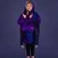 Child giving a thumbs up while wearing The Original Jr. Galaxy wearable blanket, showcasing all-day comfort and cozy coverage.