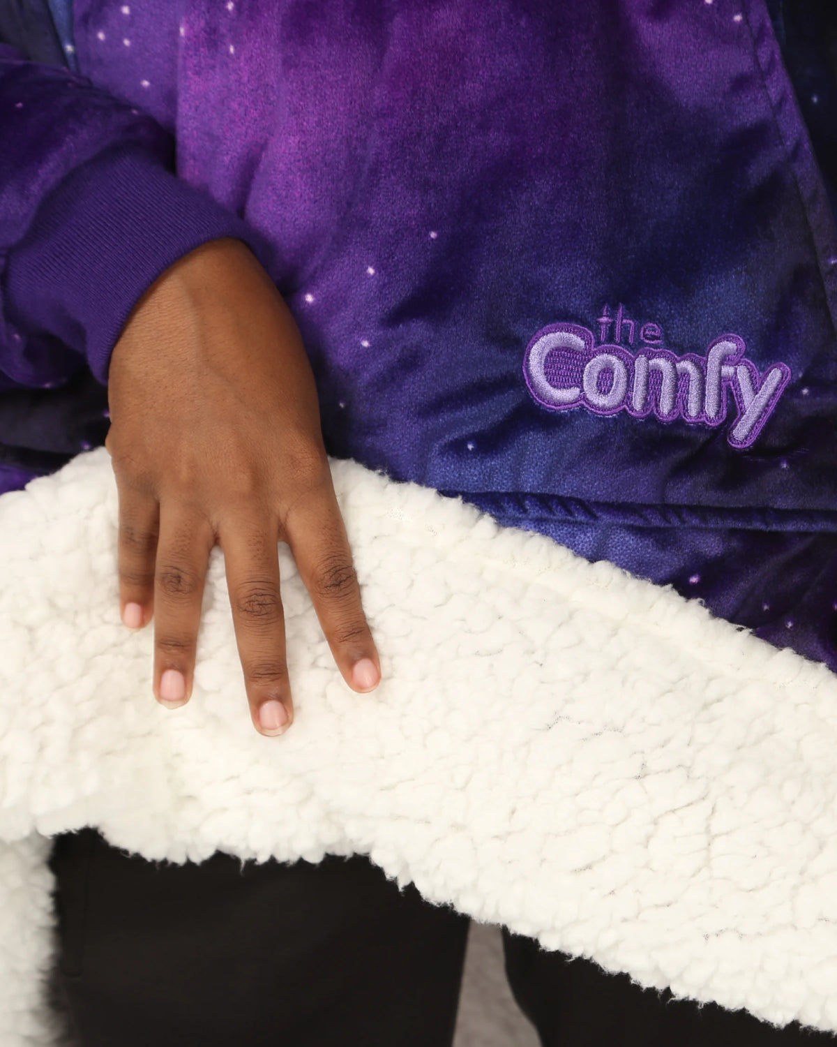 close up of the Original Jr sherpa lining and Galaxy outer print.
