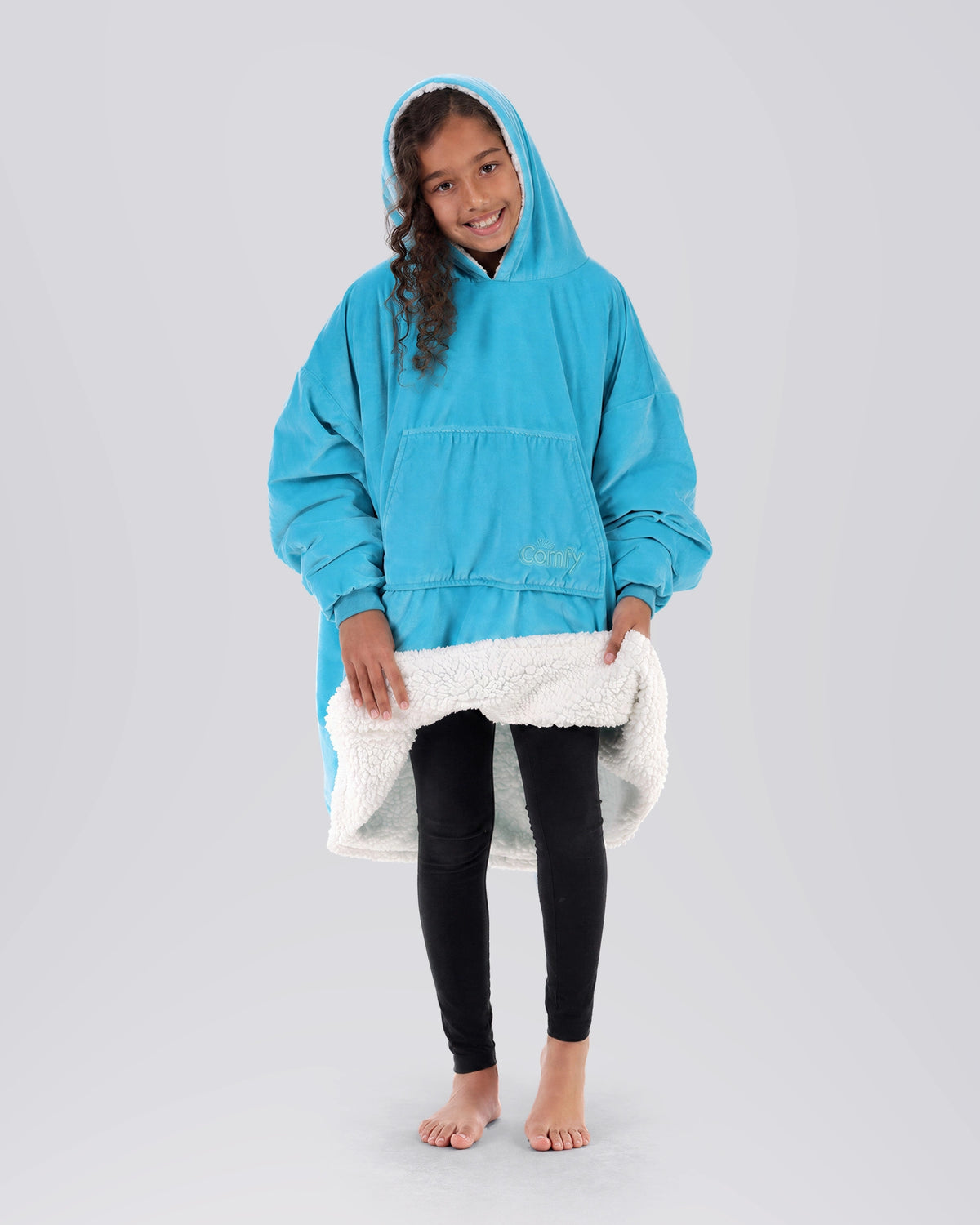 The Original Jr wearable blanket in NeonAqua, hero view.