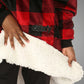 Close-up of The Original Jr. Red Plaid wearable blanket, showcasing the ultra-soft CloudSherpa™ lining and premium comfort-focused construction.