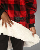 Close-up of The Original Jr. Red Plaid wearable blanket, showcasing the ultra-soft CloudSherpa™ lining and premium comfort-focused construction.