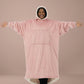Woman wearing The Comfy Original Long in blush with arms extended to show full oversized width and relaxed fit.
