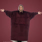 Woman wearing The Comfy Original Long in burgundy with CloudSherpa™ lining, arms extended to show oversized fit.
