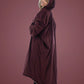 Side and back view of woman wearing The Comfy Original Long in burgundy, showing full length and hooded silhouette.